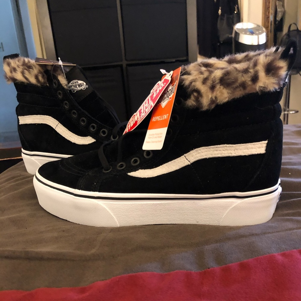 Hi top leopard print fur trim Vans.